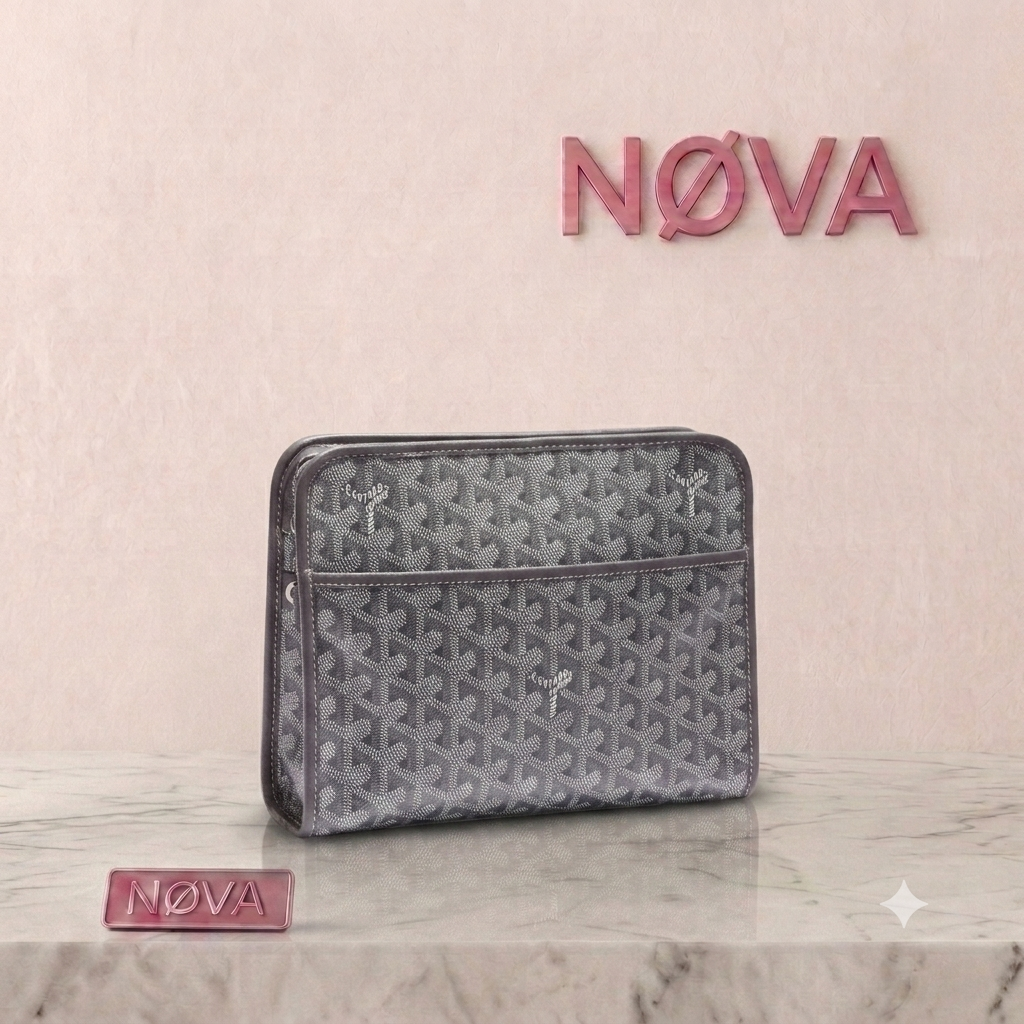Goyard Jouvence Toiletry Bag in gray with a signature pattern, featuring a zip closure and a front pocket.