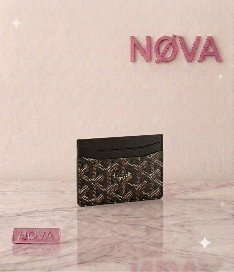 Goyard Saint Sulpice Card Wallet in brown with black trim, featuring a distinctive pattern and logo detail.